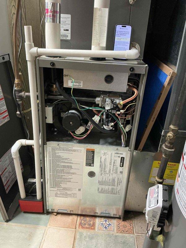 Performed seasonal tune-up on the furnace and air conditioning system. On the furnace, cleaned the flame rod and verified inducer and blower motor amp draws within range, HSI resistance within specification, and CO at 11 ppm; the heat exchanger showed minor surface rust with no cracks, and the blower wheel was slightly dirty. On the AC, the outdoor compartment and coils were clean, the capacitor and contactor tested good, and a 22° temperature differential was measured; both systems operate properly in heating and cooling modes.