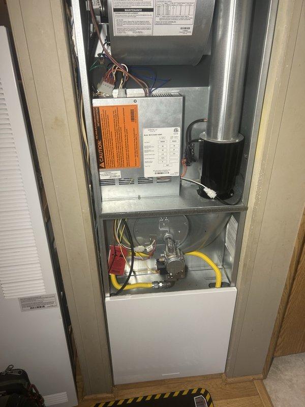 Responded to a no-heat call on a 9-month-old gas furnace and performed a full startup, observing an initial 5–7 minute thermostat call delay before the blower engaged and the heating sequence proceeded normally. Inspected the control board, ignition sequence, flame quality, and operating temperatures, and verified that the unit started and ran without issue, with no visible damage, rust, or frost at the cabinet, inducer assembly, or gas valve. Recommended seasonal furnace and AC tune-ups to maintain reliable operation.