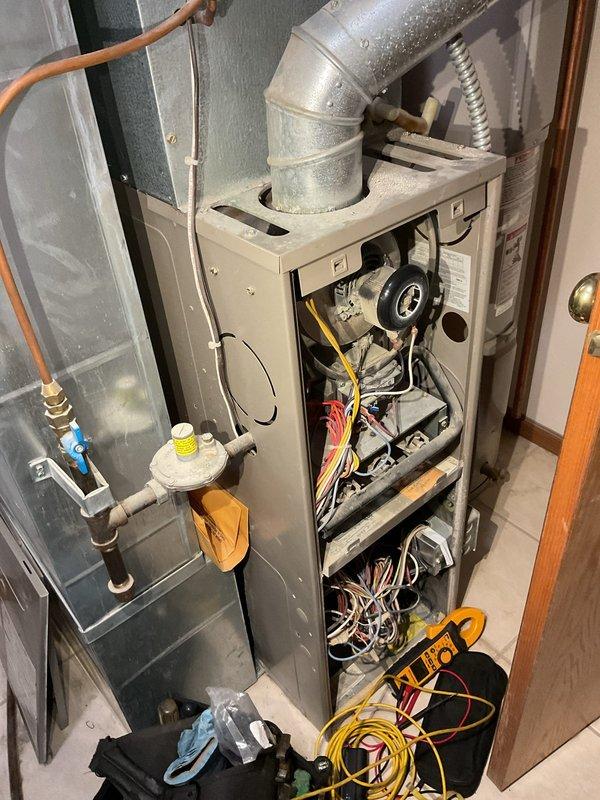 Responded to a no-heat call on a 20-year-old gas furnace and diagnosed the need for a replacement thermostat. During the inspection, a large crack was found in the heat exchanger, so the unit was red-tagged and taken out of service as a safety hazard. A comfort advisor has been scheduled to follow up with replacement options.