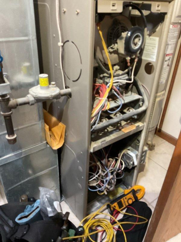 Responded to a no-heat call on a 20-year-old gas furnace and diagnosed the need for a replacement thermostat. During the inspection, a large crack was found in the heat exchanger, so the unit was red-tagged and taken out of service as a safety hazard. A comfort advisor has been scheduled to follow up with replacement options.