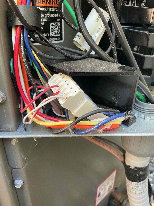 Responded to a no-heat call on a heat pump system and found the unit's settings had been turned off. Corrected the settings to restore heating operation and inspected the control compartment wiring and terminal connections, confirming all connections were secure with no signs of frost, rust, or physical damage. System operation was verified after adjustments.