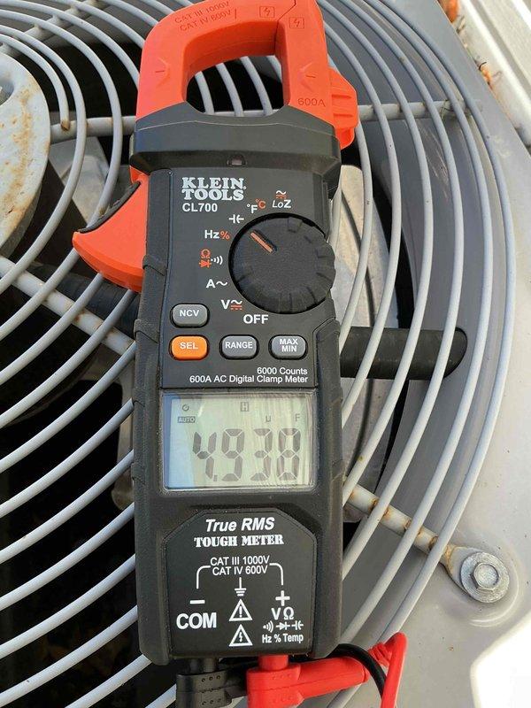 Performed seasonal maintenance on a 13-year-old furnace and 11-year-old Carrier air conditioning system. On the furnace, cleaned the flame rod and verified HSI resistance and blower motor amp draw within specification; inducer motor amp draw measured slightly above spec, heat exchanger showed minor surface rust with no cracks, CO measured 47 ppm, and the unit was confirmed heating properly. At the condenser, inspected the coil and component box (clean, free of dust and debris), confirmed capacitor and contactor were in good condition, and checked amp draw at the fan; cooling operation was not tested due to low ambient temperature (approx. 45°F).