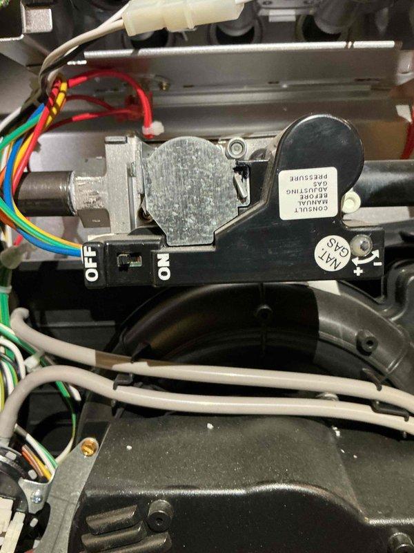 Responded to a no-heat call on a natural gas furnace and found the gas valve slide switch in the OFF position, which had been set manually after the customer shut the unit down in response to a thermostat alert. Returned the gas valve to the ON position, verified ignition and flame establishment, and confirmed the furnace is operating normally and producing heat.