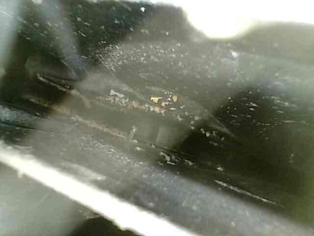 Diagnosed a no-heat condition with a "system malfunction" thermostat error and found the furnace overheating. Inspection of the secondary heat exchanger revealed significant leaking, with rust, corrosion, and mineral buildup visible along the seams. Due to the safety concern, the unit was tagged out and an advisor appointment was scheduled to review repair or replacement options.