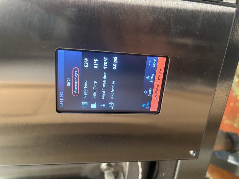 Responded to a no-heat call on an IBC boiler displaying a Low Water Pressure fault with the inlet pressure reading 0.0 psi. Verified actual system pressure at 15 psi using a calibrated gauge, then cleaned corrosion from the inlet pressure sensor plug and reinstalled it, but the display continued to read 0 psi. After consulting IBC technical support, diagnosed a failed inlet pressure sensor and wiring harness; both components have been identified for replacement and a return visit is required to complete the repair.