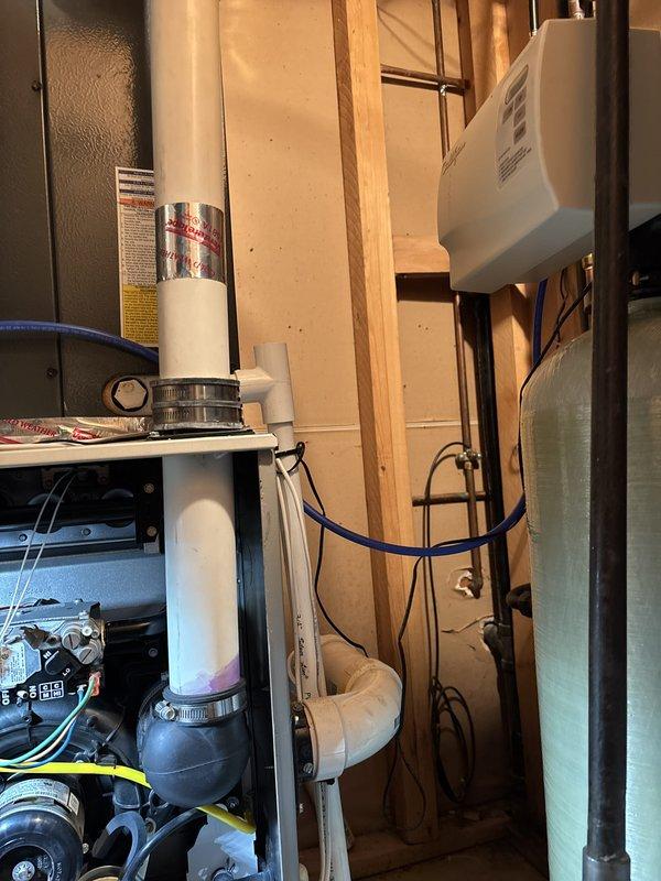 Performed annual heating maintenance on a 14-year-old furnace and humidifier. Inspected the thermostat, filter, condensate drain, blower motor, inducer motor, capacitor, and electrical wiring, and verified temperature split, heat exchanger, igniter, flame sensor, gas pressure, and CO level, all within normal parameters. Confirmed humidifier operation and drain, noting the water panel replacement was supplied by the homeowner. Both systems are operating normally; the gas fireplace is no longer serviced, and the homeowner was referred to a fireplace specialist for future maintenance.