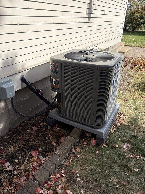 Responded to a callback for a rattling noise from the outdoor condenser fan. Inspected all electrical components, connected gauges, and verified proper system operation. Removed the top fan assembly and confirmed correct fan rotation, then reassembled the unit. The noise was intermittent on arrival and cleared after run time; the unit is operating normally, with the unique pad setup as the likely cause of the vibration. Discussed wall-mounting the condenser or adding support to the pad if the noise returns in the spring.