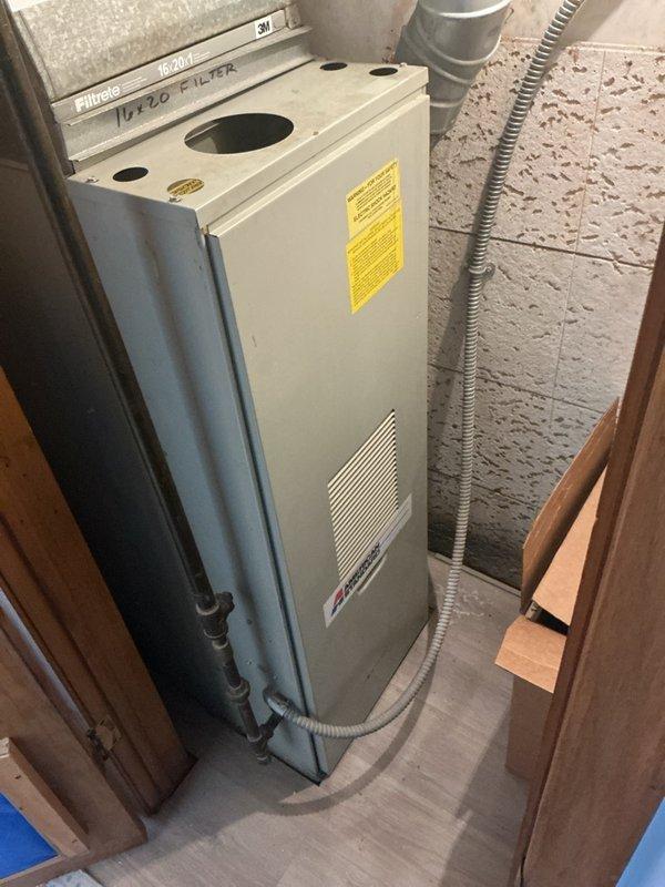 Performed scheduled maintenance on a 36-year-old gas furnace under a recurring service agreement, including a visual inspection with a borescope camera to evaluate internal components. The system is operating and burning safely at this time; however, given its age, the unit is showing signs of wear and is nearing the end of its service life, and a furnace replacement estimate was provided.