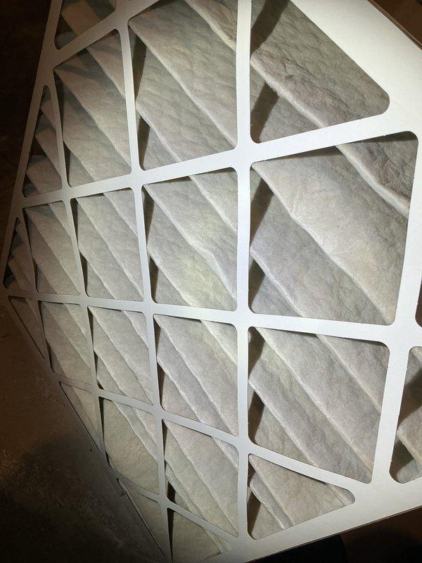 Performed a complete maintenance inspection on a 24-year-old 80% AFUE Amana gas furnace, including inspection of the filter, flame sensor/igniter assembly, and drain line. The heat exchanger was inspected and found to be in good condition, and all components checked out and operated properly, with no repairs required.