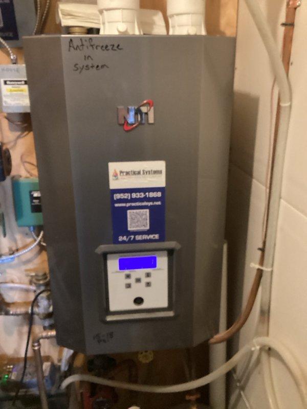 Performed heating maintenance on the furnace, including inspection of the venting and exhaust flue, camera inspection of the heat exchanger, and testing of the burners, blower, inducer, pressure and limit switches, flame sensor, igniter, gas pressures, and combustion air. The furnace was cycled and verified for safe, proper operation. The boiler was displaying a LOC 1 error code. Diagnostics found a damaged igniter and a burner with a hole burned through it, and low system pressure was corrected by adding water and setting it to 18 psi. A leak was also found beneath the boiler, and parts for the burner and igniter replacement have been ordered, with the leak to be addressed after the burner is replaced.