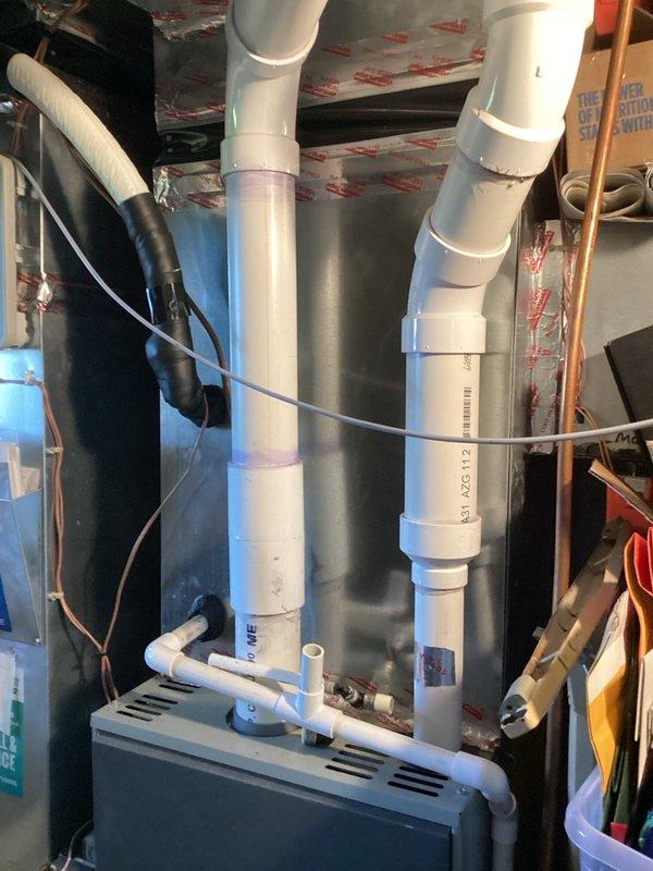 Performed heating maintenance on the furnace, including inspection of the venting and exhaust flue, camera inspection of the heat exchanger, and testing of the burners, blower, inducer, pressure and limit switches, flame sensor, igniter, gas pressures, and combustion air. The furnace was cycled and verified for safe, proper operation. The boiler was displaying a LOC 1 error code. Diagnostics found a damaged igniter and a burner with a hole burned through it, and low system pressure was corrected by adding water and setting it to 18 psi. A leak was also found beneath the boiler, and parts for the burner and igniter replacement have been ordered, with the leak to be addressed after the burner is replaced.