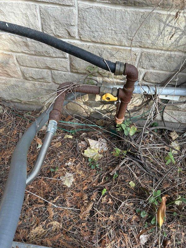 Responded to a callback for a standby generator displaying a solid red fault light and failing to start. Diagnosed an overcrank fault caused by the generator's fuel supply being shut off at the gas valve. Opened the gas supply, cleared the fault, and verified proper startup and operation, with the generator running normally.