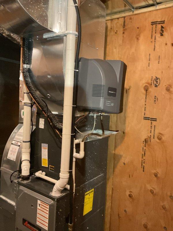 Completed annual maintenance on two furnaces, a boiler, two humidifiers, and two air exchangers. Furnace service included verifying operation, inspecting heat exchangers, checking gas pressure and flame sense, and cleaning pressure switch ports and condensate system; humidifier service included replacing the media filter on the supply unit, cleaning the second unit, and verifying water flow; air filters and air exchanger filters were replaced or checked for proper operation. The boiler's flame sensor was cleaned and in-floor heating operation was verified; the boiler heat exchanger shows light fouling, and a future teardown cleaning is recommended, which will require gaskets.