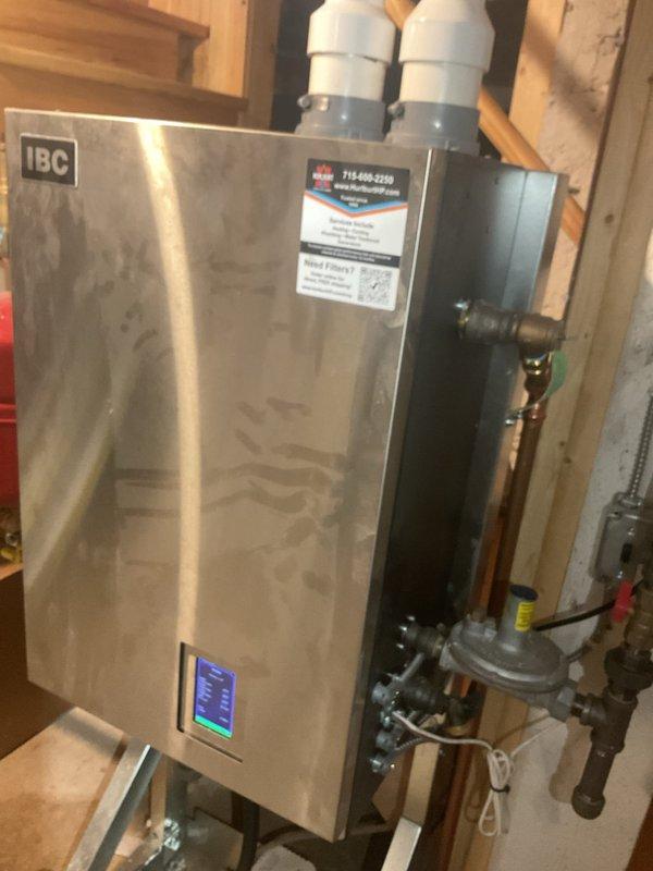 Replaced the low water cut-off (LWCO) probe, SIM, and control board on the IBC boiler, then refilled the system and verified proper operation. Performed maintenance on the second boiler, including cleaning the condensate trap and flame sensor, and bypassed a disabled outdoor sensor to complete operational checks. Both boilers tested and are operating as intended, and the geothermal unit was also run and confirmed to be functioning normally.