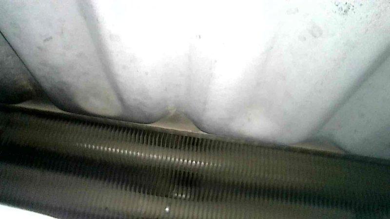 Performed a furnace tune-up and inspection, during which a hole was identified in the heat exchanger at a known failure point common to this ICP furnace model. Findings were reviewed with the homeowner at the unit, the remainder of the furnace was found to be in good condition, and the gas supply was shut off and the equipment red-tagged due to the safety hazard. Warranty coverage and replacement parts are being researched, and a sales consultation is scheduled to provide a quote for heat exchanger or furnace replacement.