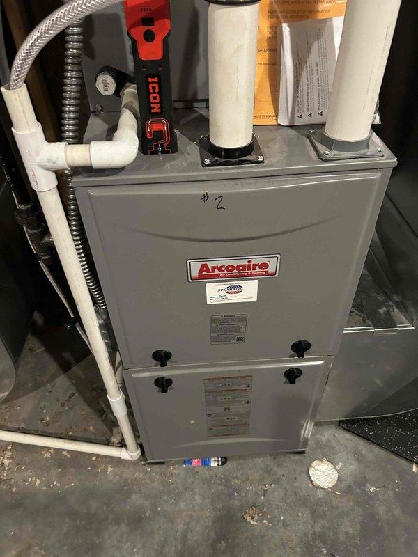Responded to a no-heat call on an Arcoaire gas furnace and replaced the defective gas valve under warranty, installing a new intake drain kit. Performed a gas leak check on all connections, then ran and verified proper operation of both first- and second-stage heating, restoring normal heat.