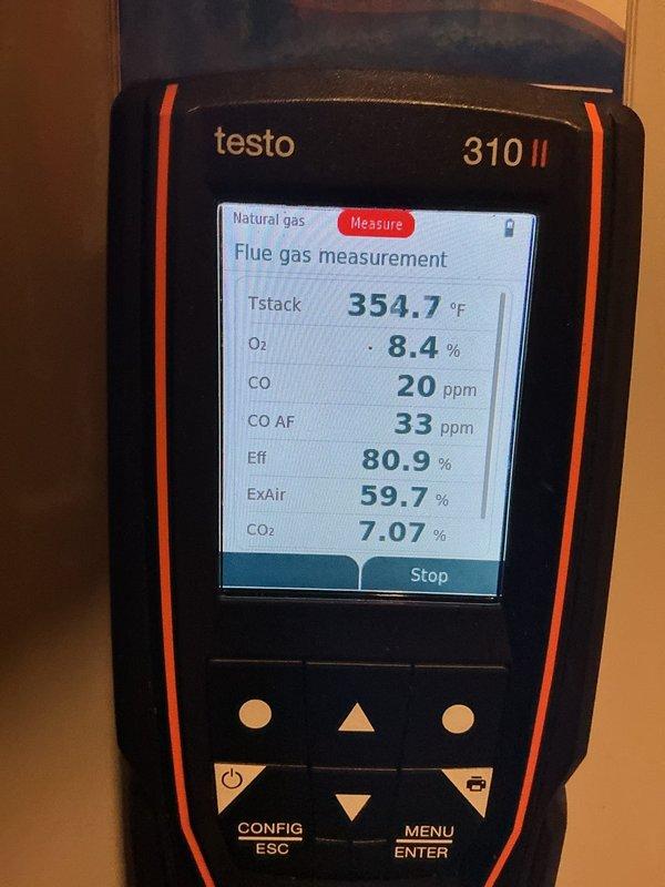 Performed a furnace tune-up and combustion analysis on a 20-year-old unit, which revealed failing ignition components, a failing inducer draft motor, an oil-leaking blower motor, and a heat exchanger with cracks and holes allowing visible flue gas leakage and carbon monoxide escaping from the cabinet during operation. The furnace was deemed unsafe to operate, and an estimate for furnace replacement was scheduled for the same day.