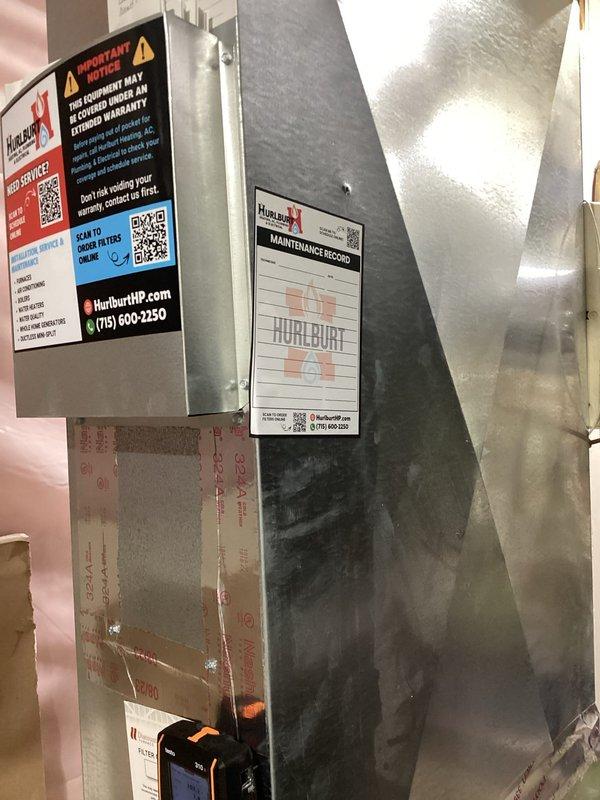 Performed annual heating maintenance on one gas furnace, including a combustion analysis of the flue gases that showed stack temperature of 103.1°F, O2 at 7.8%, CO at 8 ppm (13 ppm air-free), CO2 at 7.41%, and 94.1% efficiency, all within normal operating parameters. Initial heat pump startup failed; adjusted the thermostat settings to restore proper operation and verified the system cycled on correctly. Inspected the air filter and cabinet, noting the foil-faced seal tape at the access panel is wrinkled, peeling, and torn and should be repaired to prevent air leakage.