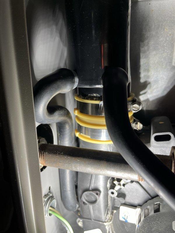 Performed a complete furnace tune-up per the maintenance checklist and documented system specifications on the tune-up form. During inspection, identified a recalled Lennox exhaust coupling on the inducer assembly that was leaking condensate into the upper cabinet, and replaced it with the updated manufacturer-approved coupling. Verified proper furnace operation following the repair and reviewed findings with the customer.