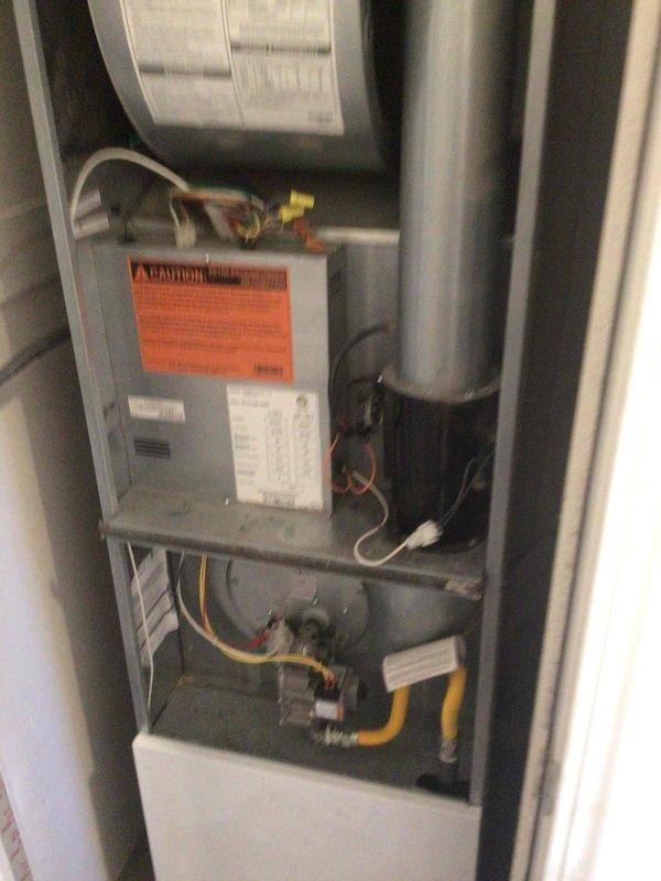 Diagnosed a no-heat condition on a 3-year-old furnace caused by a blown 3 amp low-voltage fuse. Observed internal arcing at the inducer motor wiring plug and, after de-energizing the unit, found a wire not fully seated in the connector. Reseated the wire until it locked in place, verified all connections were secure, replaced the 3 amp fuse, and tested the system to confirm proper furnace operation.