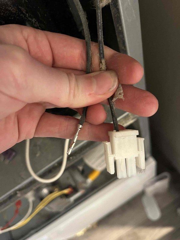Diagnosed a no-heat condition on a 3-year-old furnace caused by a blown 3 amp low-voltage fuse. Observed internal arcing at the inducer motor wiring plug and, after de-energizing the unit, found a wire not fully seated in the connector. Reseated the wire until it locked in place, verified all connections were secure, replaced the 3 amp fuse, and tested the system to confirm proper furnace operation.