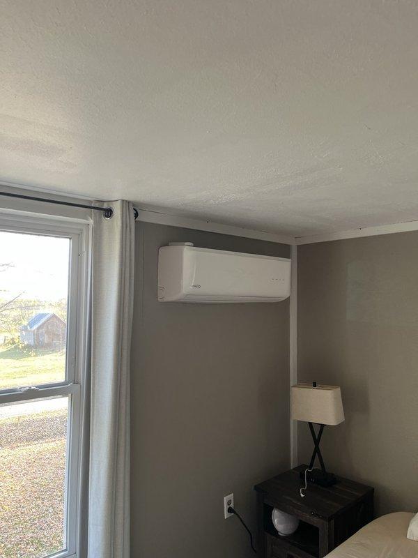 Responded to a no-heat call on a multi-head ductless mini-split system with recurring P6 fault codes and suspected refrigerant leaks at the flare connections, with the living room and secondary bedroom heads showing reduced heating performance. Inspected the indoor heads and the outdoor condenser, with no visible frost, rust, or physical damage noted, and reviewed the prior repair in which the flares on the master bedroom head were tightened. Because the symptoms have recurred, recommended re-flaring all line-set connections as the next step; the customer approved and an estimate is being prepared.