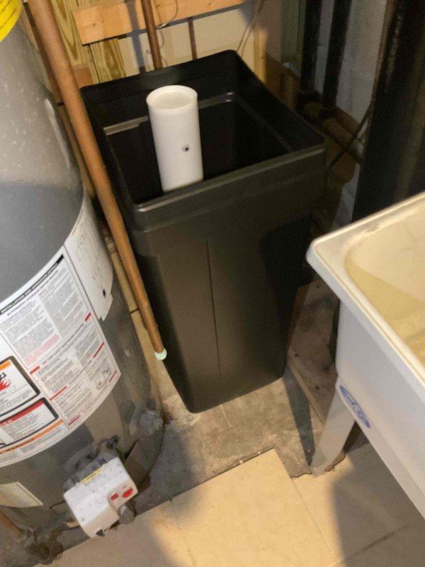 Responded to a reported water pooling concern at a previously installed water softener, with a suspected brine leak. Visually inspected the brine tank and surrounding area, confirming the brine water level was normal and the tank was holding properly. No evidence of a leak at the brine tank was identified.