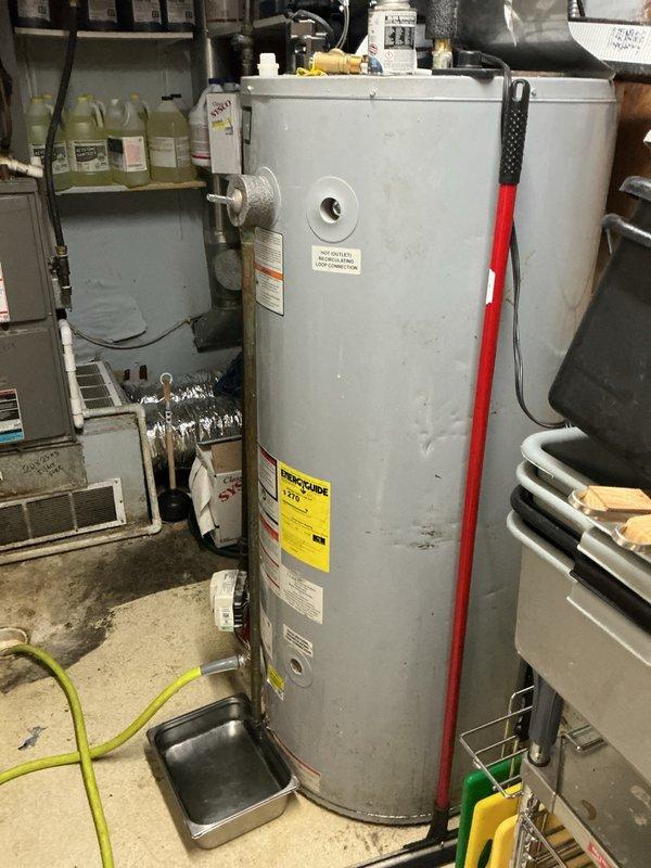 Installed a flammable vapor sensor on the commercial tanked water heater and replaced the sensor after initial installation. Because the temperature and pressure (T&P) relief valve continued to leak, a pressure reducing valve (PRV) was added to control excess system pressure and resolve the leak.