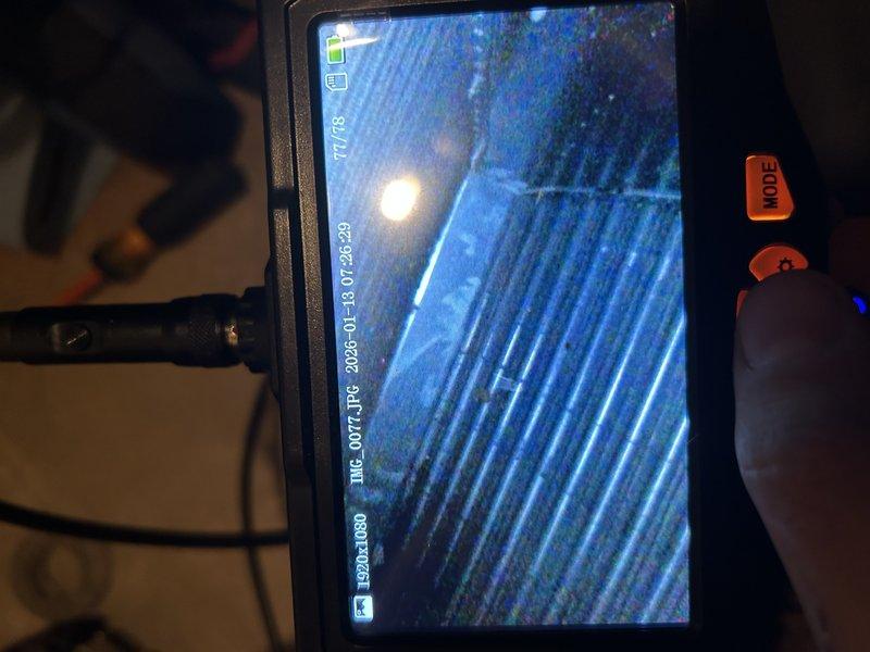 Diagnosed a furnace no-heat condition caused by a failed run capacitor, inspected the heat exchanger with a borescope, replaced the capacitor, and verified normal furnace operation. Also resolved a leaking mini split by clearing the condensate drain and locating a sag in the drain line in the attic that was trapping water; the affected section was cut out and corrected, restoring proper drainage and normal operation.