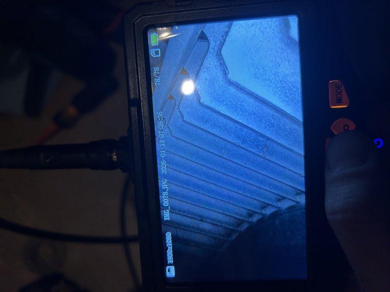 Diagnosed a furnace no-heat condition caused by a failed run capacitor, inspected the heat exchanger with a borescope, replaced the capacitor, and verified normal furnace operation. Also resolved a leaking mini split by clearing the condensate drain and locating a sag in the drain line in the attic that was trapping water; the affected section was cut out and corrected, restoring proper drainage and normal operation.