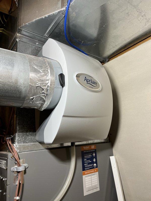 Replaced the water panel (evaporator pad #35) on the Aprilaire 600 Series whole-home humidifier in response to the customer's maintenance alert. Cleaned the humidifier tray and verified the drain line was clear and flowing properly. A furnace tune-up was offered, but the customer opted to defer it at this time.