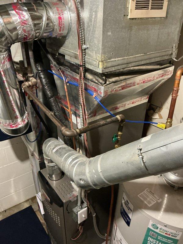 Responded to a punctured humidifier water supply line damaged during HVAC work. Rerouted the line and made new connections to the hot water supply, then restored water and pressure tested the system, confirming proper operation with no leaks present. Set the humidifier to the winter setting.