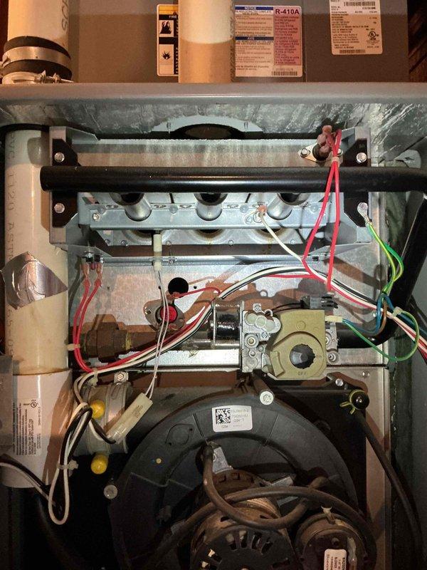 Diagnosed a no-heat condition on a 16-year-old furnace and determined the control board had failed, with the draft inducer motor relay delivering fractional voltage to the motor. Replaced the control board and verified all remaining components were operating correctly. Post-repair, the left burner flame appeared weak, indicating a probable restricted secondary heat exchanger, though borescope inspection found no visible evidence; reviewed replacement options with the homeowner.