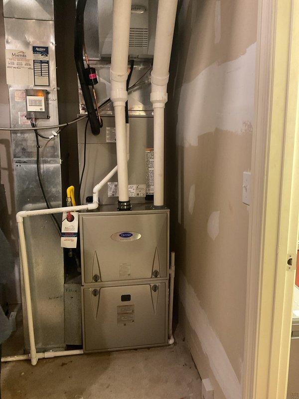 # HVAC Install - A/C & Coil Job Summary

Completed full installation of Carrier Comfort Series 26SCA448N003 single-stage air conditioning unit with matching CVAVA4821XMA evaporator coil. Removed and recycled existing outdoor condenser and indoor coil, ensuring proper disposal of refrigerant per EPA regulations. Installed new 2" PVC condenser pad for outdoor unit placement and mounted equipment with new disconnect and whip. Reconnected unit to existing line set after thorough flushing and pressure testing to verify system integrity. Inside the utility area, installed new evaporator coil and reconnected to existing supply and return ductwork. Performed complete refrigerant charge, leak test, and system startup. Verified proper airflow, temperature differential, and electrical connections throughout. Completed post-installation quality assurance inspection, explained thermostat operation and system functionality to homeowner, and registered manufacturer warranty for both units. Protected 