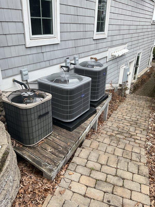 # HVAC Install - A/C & Coil Job Summary

Completed full installation of Carrier Comfort Series 26SCA448N003 single-stage air conditioning unit with matching CVAVA4821XMA evaporator coil. Removed and recycled existing outdoor condenser and indoor coil, ensuring proper disposal of refrigerant per EPA regulations. Installed new 2" PVC condenser pad for outdoor unit placement and mounted equipment with new disconnect and whip. Reconnected unit to existing line set after thorough flushing and pressure testing to verify system integrity. Inside the utility area, installed new evaporator coil and reconnected to existing supply and return ductwork. Performed complete refrigerant charge, leak test, and system startup. Verified proper airflow, temperature differential, and electrical connections throughout. Completed post-installation quality assurance inspection, explained thermostat operation and system functionality to homeowner, and registered manufacturer warranty for both units. Protected 