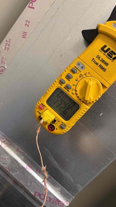 Responded to service call for furnace that would not shut off when reaching set temperature. Unit located on second floor in utility closet serving right side of residence. Upon inspection, diagnosed issue with thermostat control circuit and wiring connections at control board. Examined SEC-2 SE status board and terminal connections, noting multiple wire terminations requiring attention. Tested electrical continuity and voltage readings using digital clamp meter to verify proper circuit operation. Addressed faulty control signal preventing proper cycle termination, ensuring furnace now responds correctly to thermostat satisfaction calls and shuts down as designed.