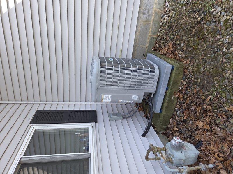 Completed preventive maintenance inspection on residential air conditioning system. Performed comprehensive evaluation of outdoor condensing unit, verified proper refrigerant line connections, and documented equipment condition through photographic records. System operational and maintenance contract extended through expiration date.