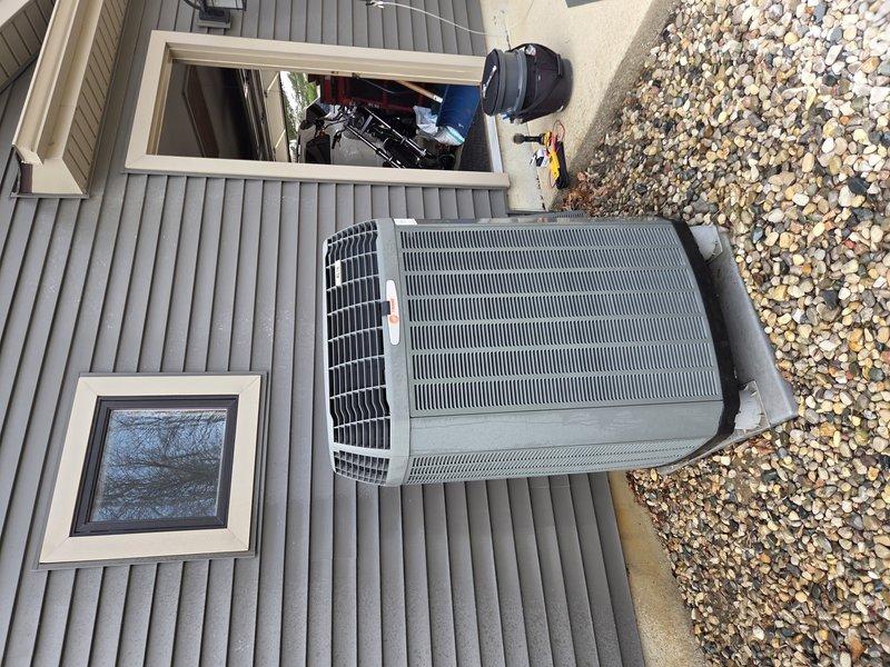 Completed comprehensive air conditioning tune-up and system inspection for residential split system unit. Performed electrical connection inspection at terminal block, verified all wire terminations were secure, and confirmed proper voltage at connection points. Conducted outdoor condenser unit evaluation, inspected coil condition, verified proper airflow through ventilation grilles, and confirmed unit was operating within manufacturer specifications.