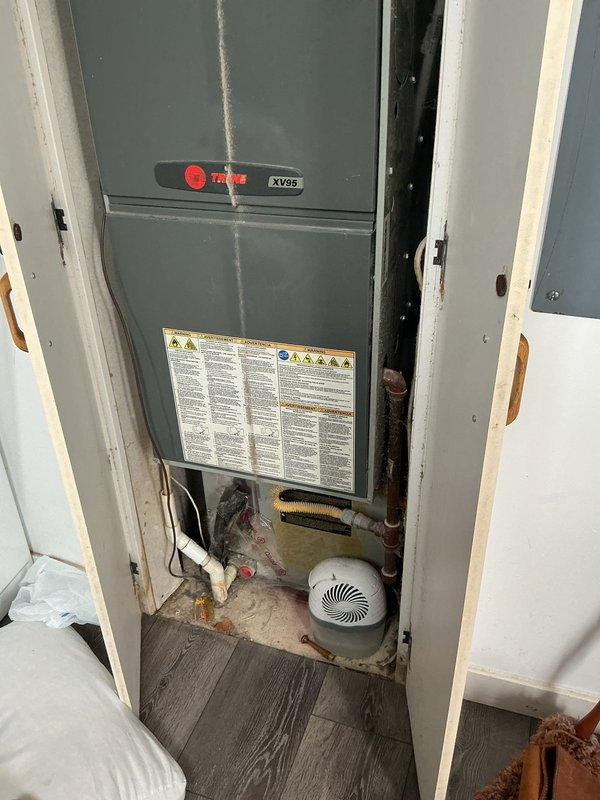 Conducted on-site evaluation of non-operational HVAC system consisting of Trane XV95 high-efficiency furnace and existing air conditioning unit. Assessed current equipment configuration including condensate pump, drainage system, and Honeywell Home ProSeries thermostat. Provided comprehensive replacement estimate and discussed equipment options with homeowner, including self-installation possibilities and available financing programs for complete system replacement.