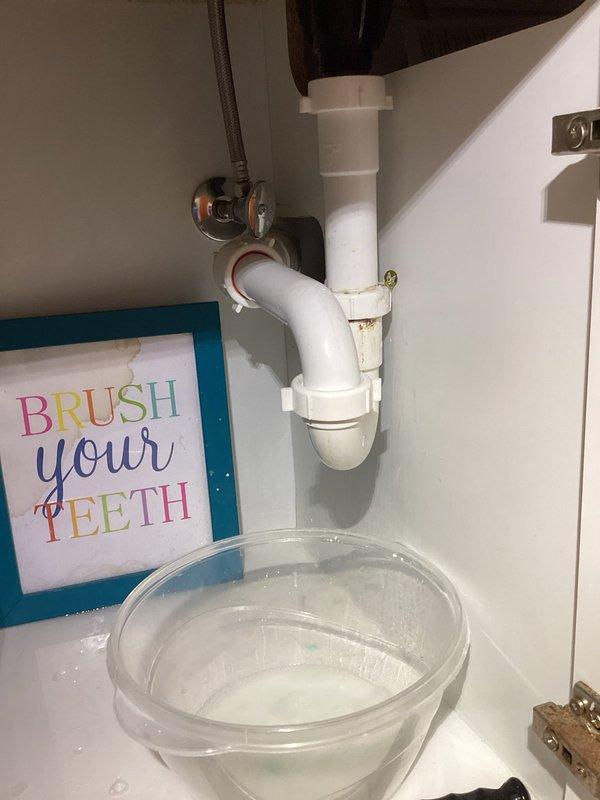 Responded to service call for multiple plumbing leaks in residential property. Inspected and repaired leaking sink drain assembly in upstairs hall bathroom, including examination of P-trap configuration and supply line connections. Addressed kitchen sink drain leak by servicing drain assembly and associated fittings. Performed comprehensive inspection of dishwasher connections, supply lines, and drain hose to verify proper operation and confirm no leaks present. All plumbing fixtures tested and left in proper working condition.