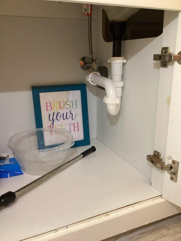 Responded to service call for multiple plumbing leaks in residential property. Inspected and repaired leaking sink drain assembly in upstairs hall bathroom, including examination of P-trap configuration and supply line connections. Addressed kitchen sink drain leak by servicing drain assembly and associated fittings. Performed comprehensive inspection of dishwasher connections, supply lines, and drain hose to verify proper operation and confirm no leaks present. All plumbing fixtures tested and left in proper working condition.