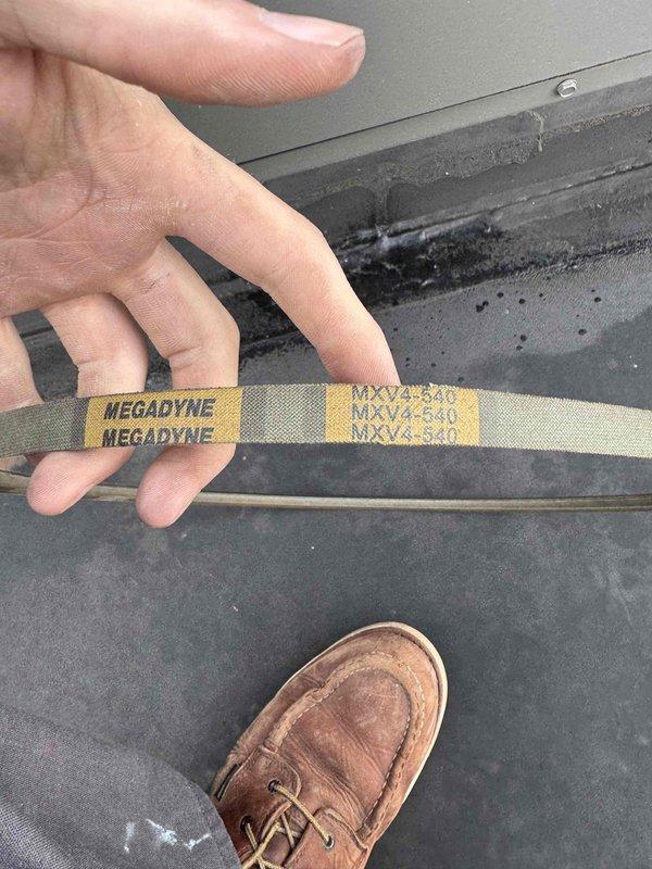 Performed initial assessment of furnace system in attic space. Identified access constraints preventing completion of thermostat wiring installation. Inspected HVAC unit and documented equipment details, including belt component showing wear on Megadyne MXV2-940 belt. Determined that thermostat wiring location needs to be traced before proper installation can proceed. Scheduled return visit with technician capable of accessing confined attic space to complete thermostat wiring and installation work.