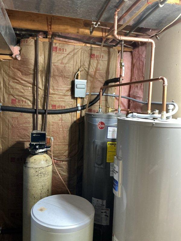 Completed installation of Waterfurnace W5AV036BD1A12NTR2B01 3-ton 2-stage variable speed 5 series geothermal heat pump system with IntelliStart technology and cupronickel water coil for enhanced mineral resistance. Installed EAL10 10KW internal electric backup heat, WWK2T well water kit with slow-closing solenoid valve to prevent water hammer, flow regulator, Honeywell 8000 digital programmable touchscreen thermostat, and I-WAVE R air purifier.

Repositioned unit 90 degrees to relocate return air intake from rear to right side for improved accessibility and airflow management. Connected unit to existing ductwork and performed necessary duct modifications to accommodate new orientation. Reconnected system to existing open-loop geothermal piping system and verified proper water flow rates. Reconnected desuperheater to existing water heater for domestic hot water heating efficiency. Completed all high and low voltage wiring connections to geothermal unit, thermostat, and system controls.

