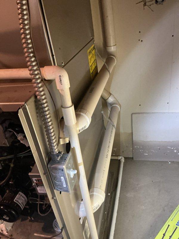 Provided estimate for replacement of 2006 Carrier gas furnace following basement flooding caused by sump pump failure. Water intrusion resulted in blower circulating water throughout the system, and inducer motor exhibited excessive noise independent of water damage. Unit currently operational but replacement recommended due to age and water exposure compromising long-term reliability.