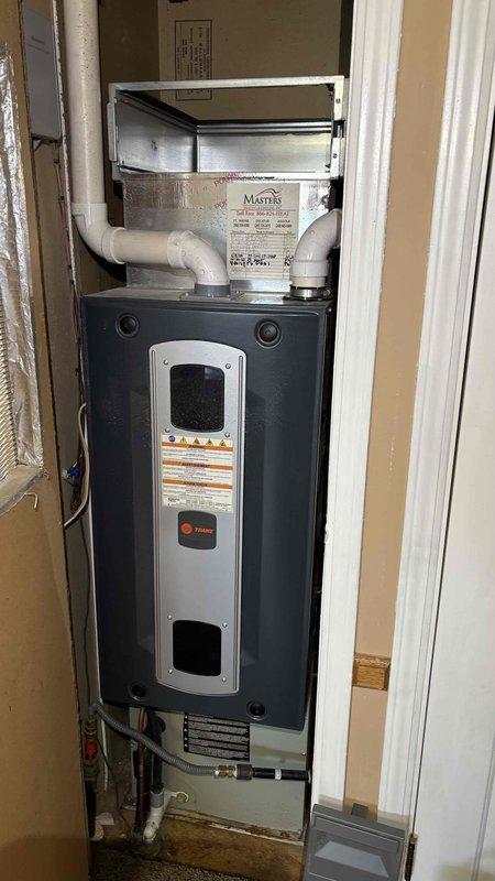 Performed comprehensive air conditioning tune-up and cleaning service on Trane HVAC system. Conducted thorough inspection of furnace and air handler assembly, verified all electrical connections and voltage readings using digital multimeter, and cleaned system components to ensure optimal performance for the upcoming cooling season. System tested and confirmed operational within manufacturer specifications.