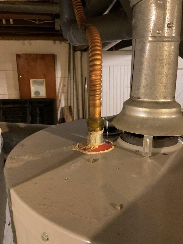 Supplied and installed a cabinet-style water softener unit on the rear basement wall between the electrical outlet and floor drain. Routed 3/4" PEX water piping from above the washing machine area before the main line tees off to separate fixtures, running both supply and return lines to the softener location. Completed installation with two bags of yellow salt, ensuring the system was fully operational and ready for use.