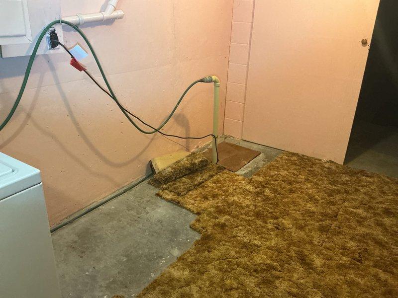 Conducted estimate for complete HVAC system replacement at residential property with existing 1960s-era forced air cooling system and baseboard heating. Assessed attic-mounted blower unit and evaluated current infrastructure for full system upgrade. Documented existing conditions including interior living spaces and basement utility areas where new equipment and ductwork modifications will be required.