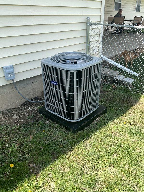 # HVAC Complete System Installation

Successfully completed full HVAC system replacement including installation of Carrier Comfort Series single-stage air conditioner (model 26SCA424N003), evaporator coil (model CVAVA3014XMA), and single-stage gas furnace (model 58SB0B070M14--12). Removed and recycled existing equipment from residential property.

## Equipment Installation

Installed outdoor condensing unit on new 2" PVC pad against exterior wall with proper clearances maintained. Mounted new electrical disconnect and whip for condenser power supply. Positioned evaporator coil and furnace indoors, completing changeout from existing 80% efficiency system. All equipment installed per manufacturer specifications and local code requirements.

## System Connections and Testing

Reconnected to existing refrigerant line set after performing thorough flush and pressure test to verify system integrity. Reconnected existing supply and return ductwork to new furnace plenum. Performed refrigerant 