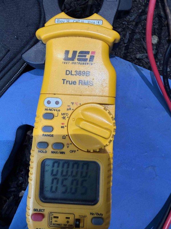 Completed comprehensive air conditioning tune-up and system evaluation. Inspected electrical components including capacitor and terminal connections, noting visible oxidation and corrosion on terminal block requiring monitoring for future replacement. Performed electrical diagnostics using digital multimeter to verify proper voltage, amperage, and system performance parameters, confirming unit operating within manufacturer specifications.