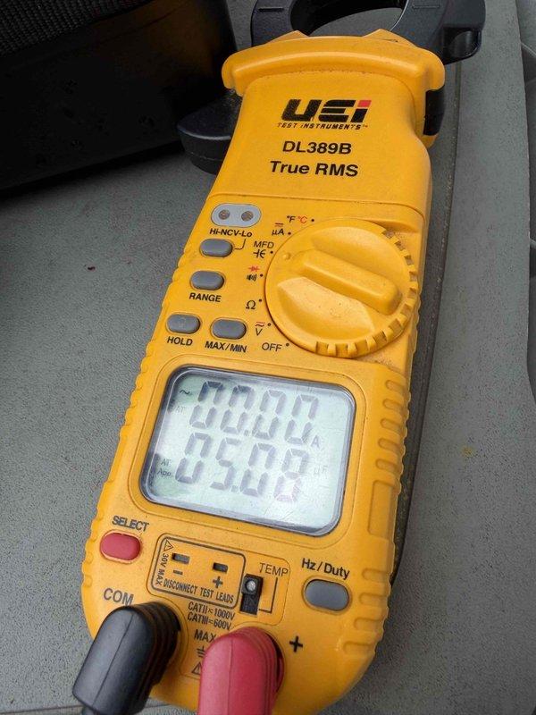 Completed first prepaid cooling maintenance visit on residential HVAC system. Upon inspection, discovered significant frost and ice accumulation on evaporator coil louvers, indicating potential airflow restriction, refrigerant charge issues, or system operating problems. Performed diagnostic testing using digital multimeter to measure electrical parameters and system performance values to identify root cause of freezing condition and ensure proper system operation.